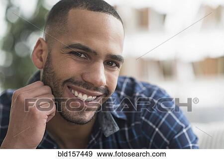Close up of Hispanic man smiling View Large Photo Image Stock Photo - Close up of Hispanic man smiling. Fotosearch