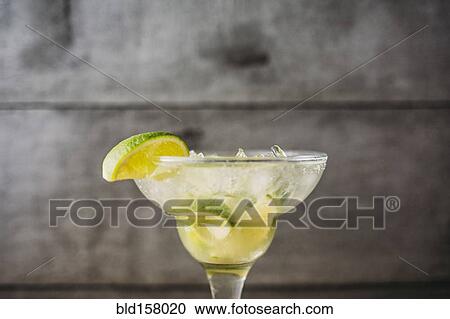 Close up of mojito cocktail drink with lime View Large Photo Image Stock Image - Close up of mojito cocktail drink with lime. Fotosearch