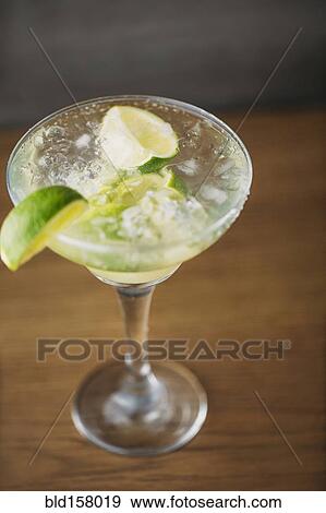 Close up of mojito cocktail drink with lime View Large Photo Image Stock Photo - Close up of mojito cocktail drink with lime. Fotosearch