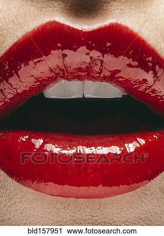 Close up of mouth of woman wearing red lipstick View Large Photo Image Stock Image - Close up of mouth of woman wearing red lipstick. Fotosearch
