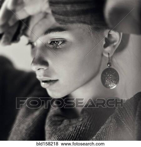 Stock Photo - Close up of pensive Caucasian girl. Fotosearch