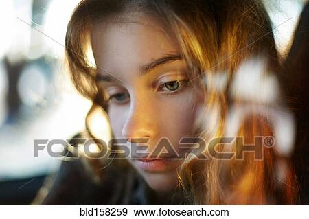 Close up of sad Caucasian girl View Large Photo Image Stock Photo - Close up of sad Caucasian girl. Fotosearch