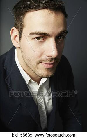 Close up of serious Caucasian man View Large Photo Image Stock Photography - Close up of serious Caucasian man. Fotosearch