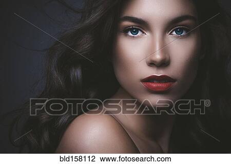 Close up of serious glamorous woman View Large Photo Image Stock Image - Close up of serious glamorous woman. Fotosearch