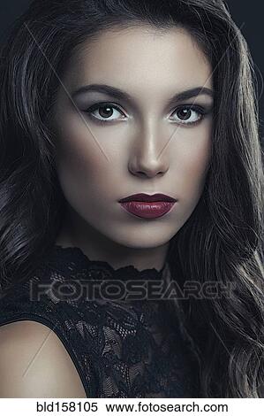 Stock Photography - Close up of serious glamorous woman. Fotosearch