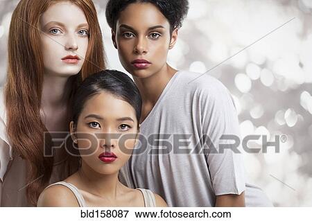 Close up of serious women posing View Large Photo Image Stock Photo - Close up of serious women posing. Fotosearch