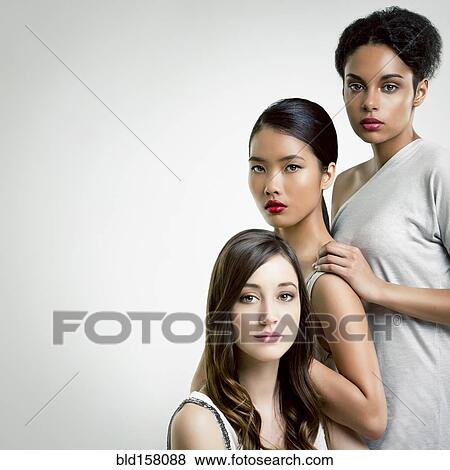 Close up of serious women posing View Large Photo Image Stock Photo - Close up of serious women posing. Fotosearch