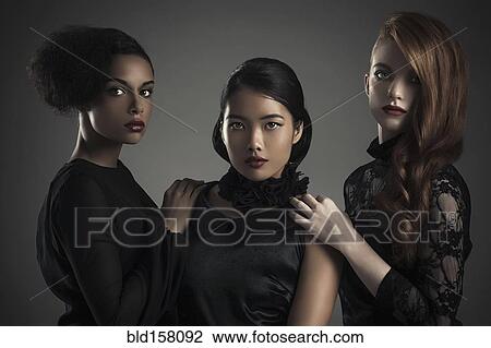 Close up of serious women standing together View Large Photo Image Stock Image - Close up of serious women standing together. Fotosearch