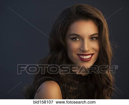 Close up of smiling glamorous woman View Large Photo Image Stock Photo - Close up of smiling glamorous woman. Fotosearch