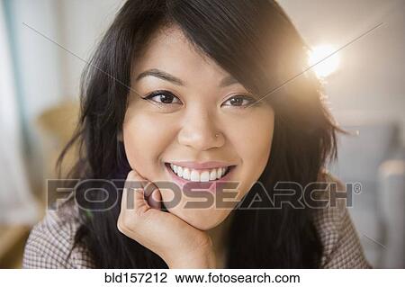 Close up of smiling Pacific Islander woman View Large Photo Image Stock Image - Close up of smiling Pacific Islander woman. Fotosearch