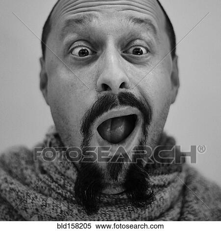 Stock Photography - Close up of surprised Caucasian man. Fotosearch