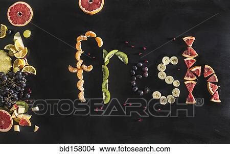 Close up of the word fresh written with sliced fruit View Large Photo Image Picture - Close up of the word fresh written with sliced fruit. Fotosearch