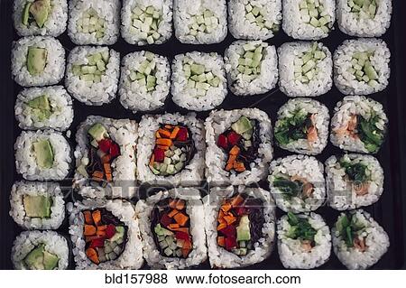 Close up of tray of sushi rolls View Large Photo Image Stock Photo - Close up of tray of sushi rolls. Fotosearch