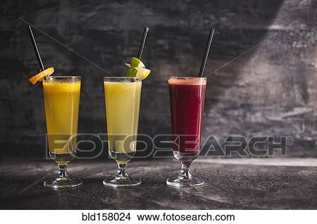 Picture - Close up of variety of healthy juices. Fotosearch