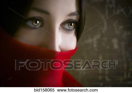 Close up of woman wearing red face scarf View Large Photo Image Stock Photography - Close up of woman wearing red face scarf. Fotosearch