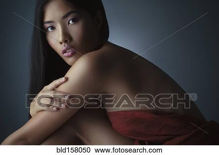 Close up of woman wrapped in blanket View Large Photo Image Stock Image - Close up of woman wrapped in blanket. Fotosearch