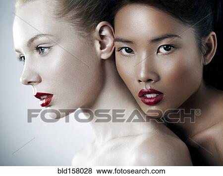 Close up of women wearing red lipstick View Large Photo Image Stock Photo - Close up of women wearing red lipstick. Fotosearch