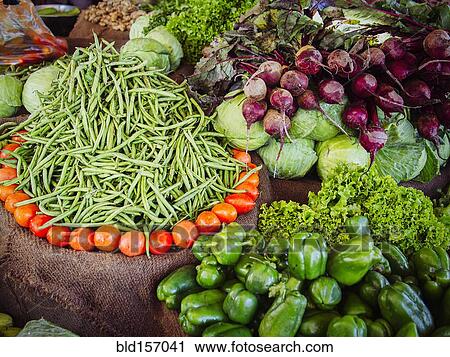 Stock Image - Fresh vegetables for sale in market. Fotosearch