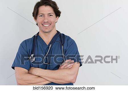 Stock Image - Hispanic doctor with stethoscope smiling. Fotosearch