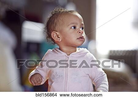 Mixed race baby girl looking away View Large Photo Image Picture - Mixed race baby girl looking away. Fotosearch