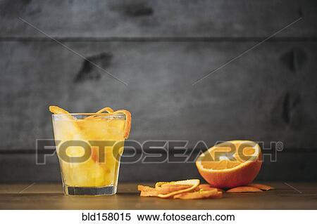Orange juice with peel and sliced fruit View Large Photo Image Stock Photography - Orange juice with peel and sliced fruit. Fotosearch