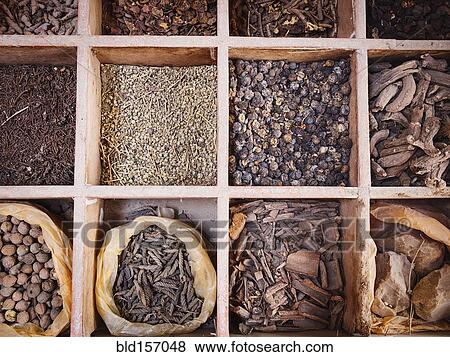 Overhead view of dried spices for sale in market View Large Photo Image Stock Photo - Overhead view of dried spices for sale in market. Fotosearch