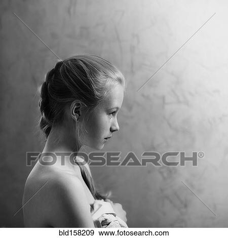 Stock Photo - Profile of Caucasian girl with braided hair. Fotosearch