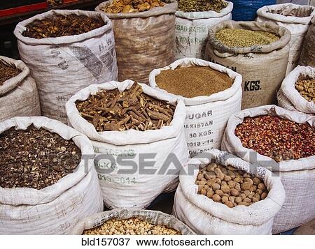 Stock Photo - Sacks of spices for sale in market. Fotosearch