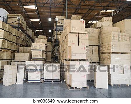 Cardboard boxes in warehouse View Large Photo Image Stock Photo - Cardboard boxes in warehouse. Fotosearch