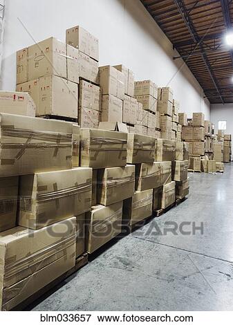 Cardboard boxes in warehouse View Large Photo Image Stock Photo - Cardboard boxes in warehouse. Fotosearch