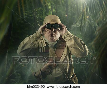 Caucasian hunter peering through binoculars in jungle View Large Photo Image Stock Image - Caucasian hunter peering through binoculars in jungle. Fotosearch