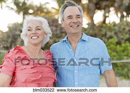 Close up of older Caucasian couple hugging View Large Photo Image Stock Image - Close up of older Caucasian couple hugging. Fotosearch