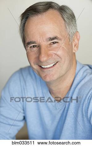 Stock Image - Close up of older Caucasian man smiling. Fotosearch