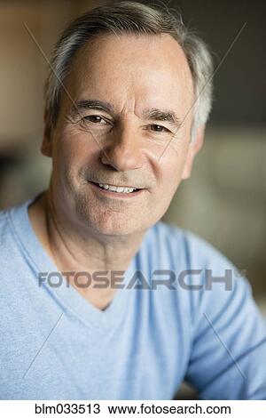 Stock Image - Close up of older Caucasian man smiling. Fotosearch