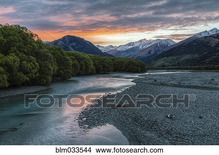 Mountains over remote river, Glenorchy, Central Otago, New Zealand View Large Photo Image Picture - Mountains over remote river, Glenorchy, Central Otago, New Zealand. Fotosearch