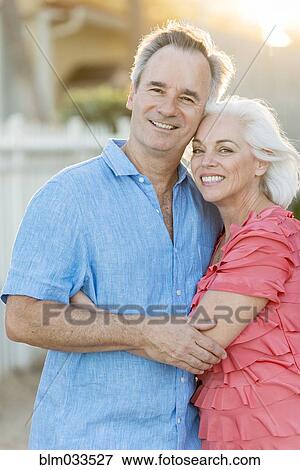 Older Caucasian couple walking on beach View Large Photo Image Stock Photo - Older Caucasian couple walking on beach. Fotosearch