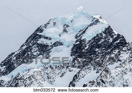 Stock Image - Snowcapped mountain top. Fotosearch