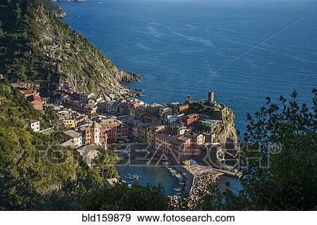 Stock Photo - Aerial view of Cinque Terre cityscape and ocean cliffs, Liguria, Italy. Fotosearch