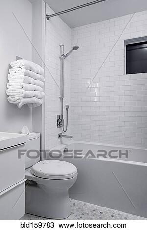 Bathtub, toilet and shower in modern bathroom View Large Photo Image Stock Image - Bathtub, toilet and shower in modern bathroom. Fotosearch