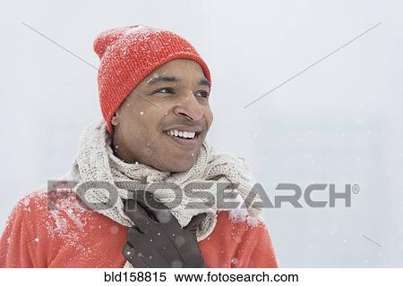 Black man wearing gloves and scarf in snow View Large Photo Image Stock Photography - Black man wearing gloves and scarf in snow. Fotosearch