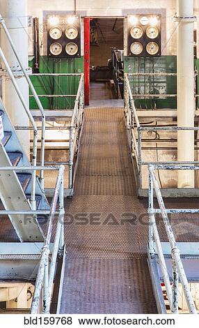 Stock Photo - Catwalk in industrial steam plant factory. Fotosearch