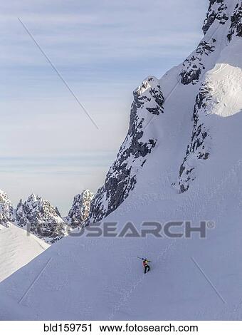 Caucasian climber scaling snowy mountain slope View Large Photo Image Stock Image - Caucasian climber scaling snowy mountain slope. Fotosearch