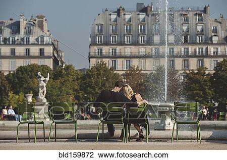 Caucasian couple admiring fountain in urban park, Paris, Ile-de-France, France View Large Photo Image Stock Image - Caucasian couple admiring fountain in urban park, Paris, Ile-de-France, France. Fotosearch