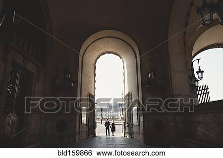 Caucasian couple standing in church archway View Large Photo Image Stock Photograph - Caucasian couple standing in church archway. Fotosearch