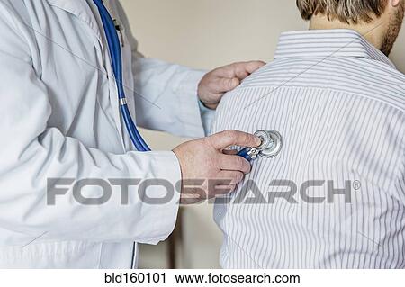 Caucasian doctor listening to heartbeat of patient View Large Photo Image Stock Image - Caucasian doctor listening to heartbeat of patient. Fotosearch