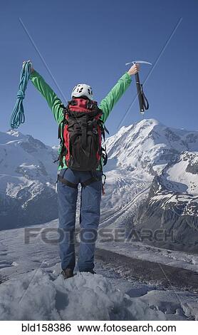 Caucasian hiker cheering on mountaintop, Monte Rosa, Alps, Italy View Large Photo Image Stock Photograph - Caucasian hiker cheering on mountaintop, Monte Rosa, Alps, Italy. Fotosearch