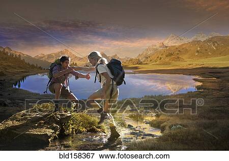 Caucasian hikers walking near remote lake, Lai da Vons, Canton Graubunden, Switzerland View Large Photo Image Stock Photo - Caucasian hikers walking near remote lake, Lai da Vons, Canton Graubunden, Switzerland. Fotosearch