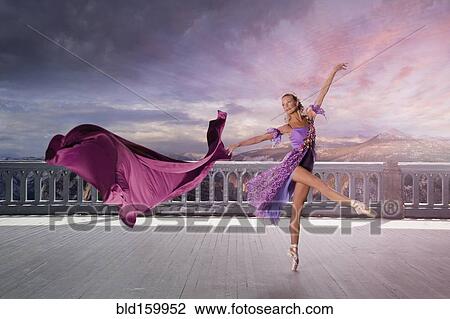 Caucasian woman ballet dancing on balcony View Large Photo Image Stock Image - Caucasian woman ballet dancing on balcony. Fotosearch