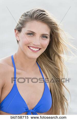 Caucasian woman wearing bikini on beach View Large Photo Image Stock Photography - Caucasian woman wearing bikini on beach. Fotosearch