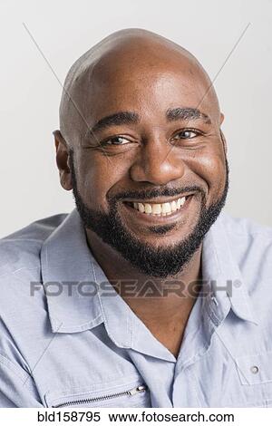 Close up of black man smiling View Large Photo Image Stock Photography - Close up of black man smiling. Fotosearch